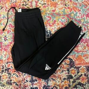 Adidas Black Sweatpants with Three-Stripe Design